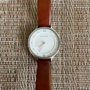Skagen white face crystal watch, saddle brown leather band.